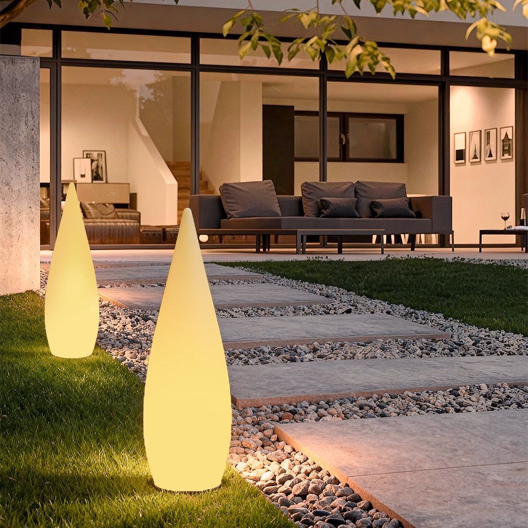 Modern teardrop outdoor lights placed along modern patio landscape.