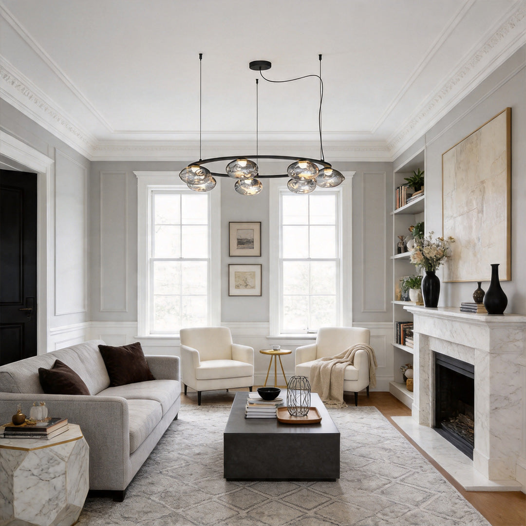 Elegant modern traditional chandelier in a classic living room with fireplace.