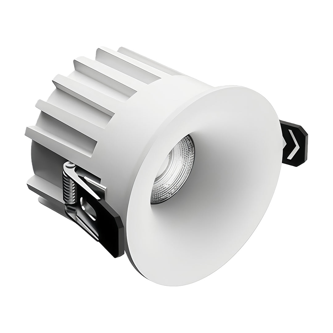 Modern trimless recessed downlight featuring LED module and white finish from angled perspective