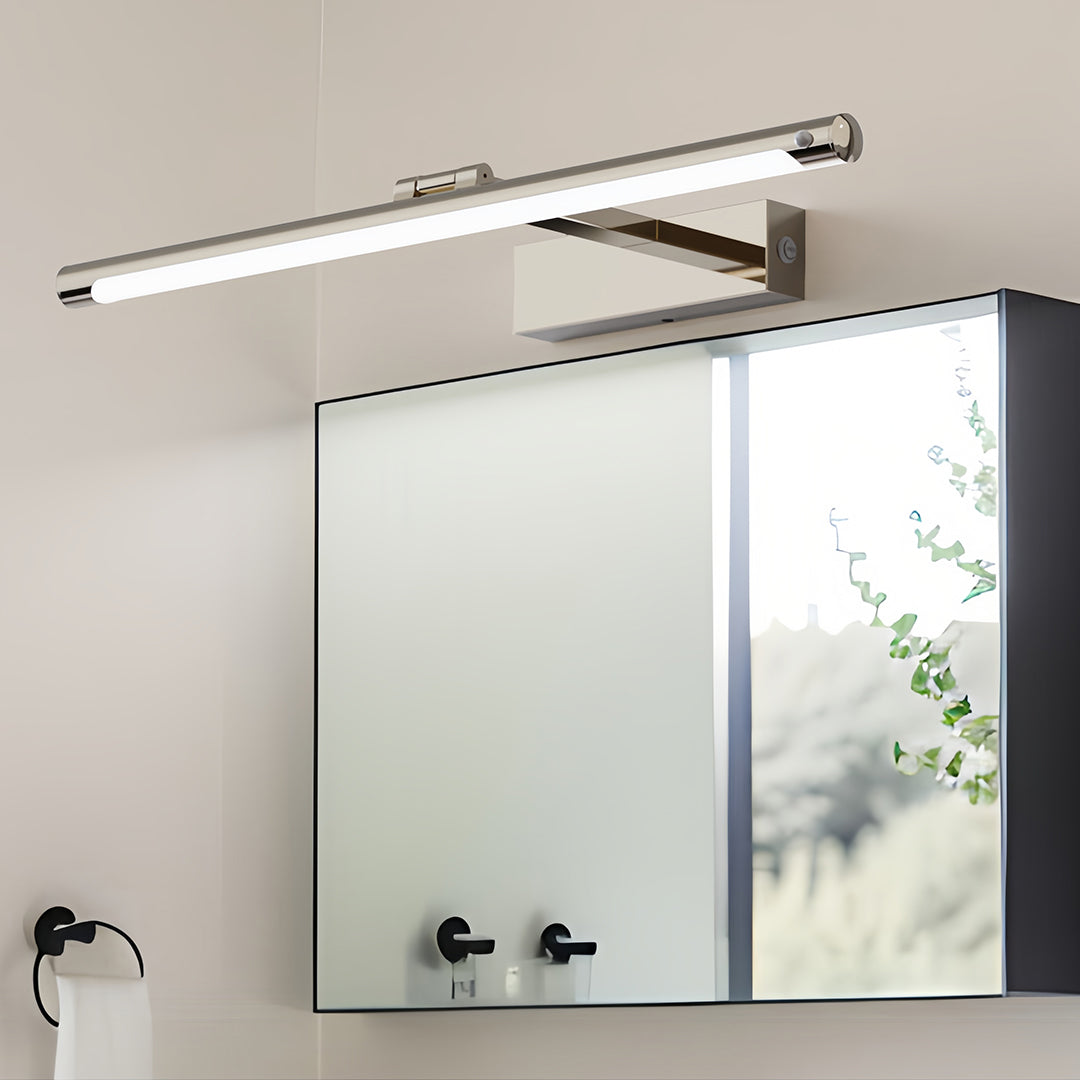 Modern bathroom vanity light installed above mirror with minimalist design creating soft illumination