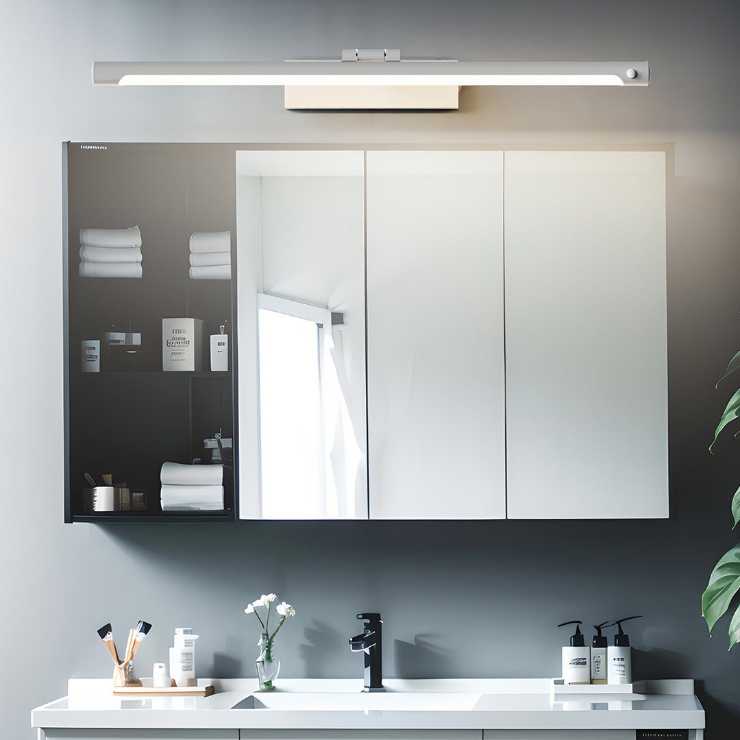 Modern bathroom vanity light enhancing sophisticated bathroom space with dark walls and modern fixtures