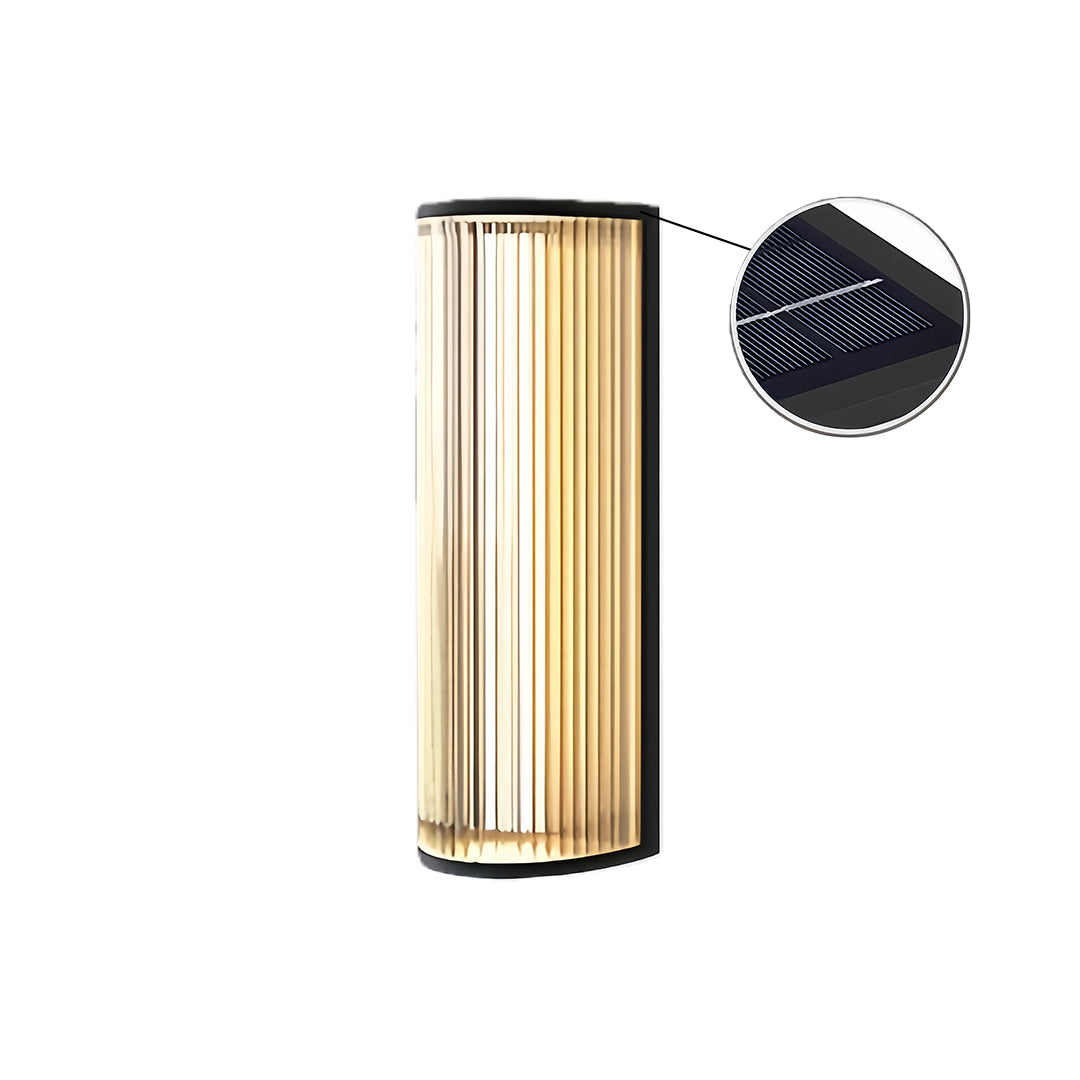 Modern vertical wall sconce lighting with fluted glass, showing a close-up inset of the top solar panel.