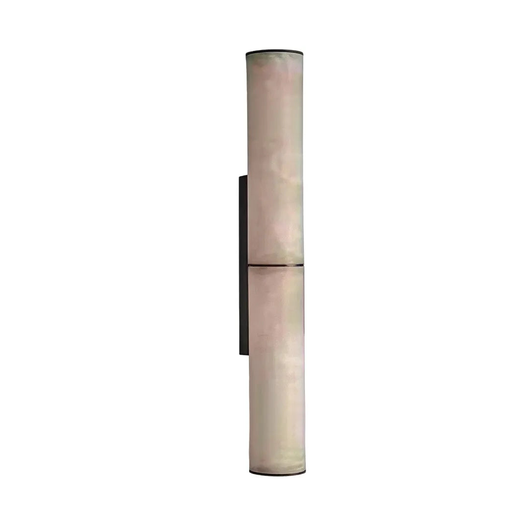 Modern vertical wall sconce product image showing a slim cylindrical design with a black backplate.