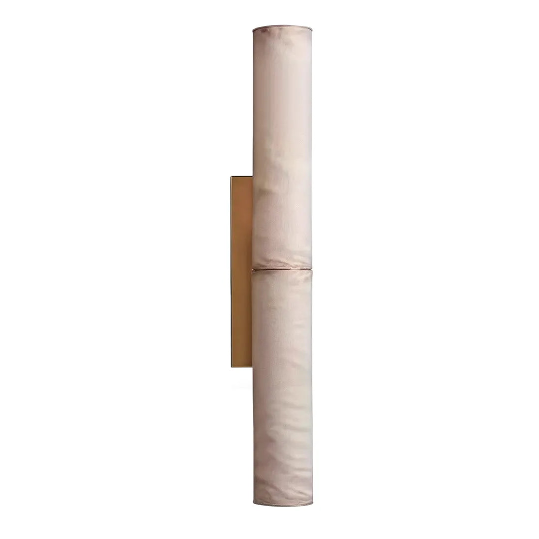 Modern vertical wall sconce product image featuring a tall marble-look cylinder with a brass backplate.