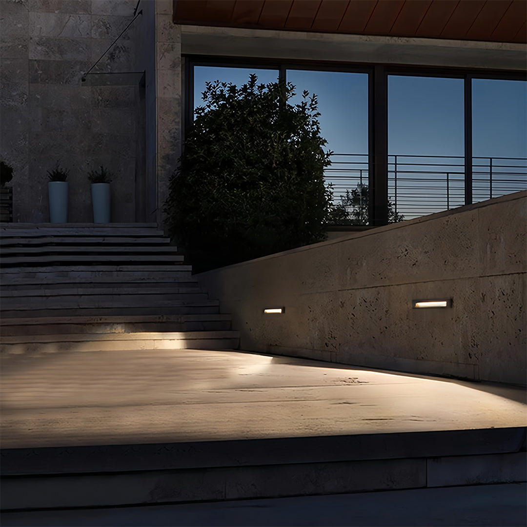 Deck lights for steps installed in modern outdoor walkway providing guidance and safety lighting