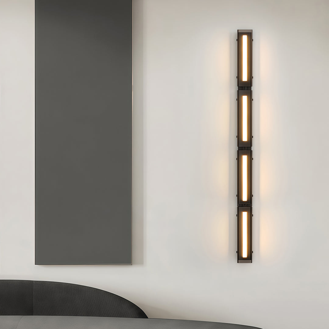 Modern wall light decoration installed near a window, providing a warm and inviting glow.