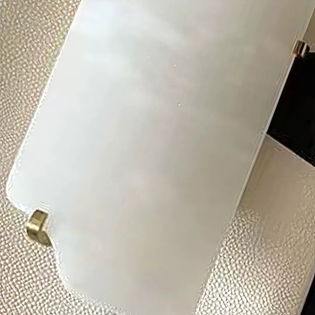 Modern wall light fixtures detail showing the frosted glass shade and soft curved silhouette.