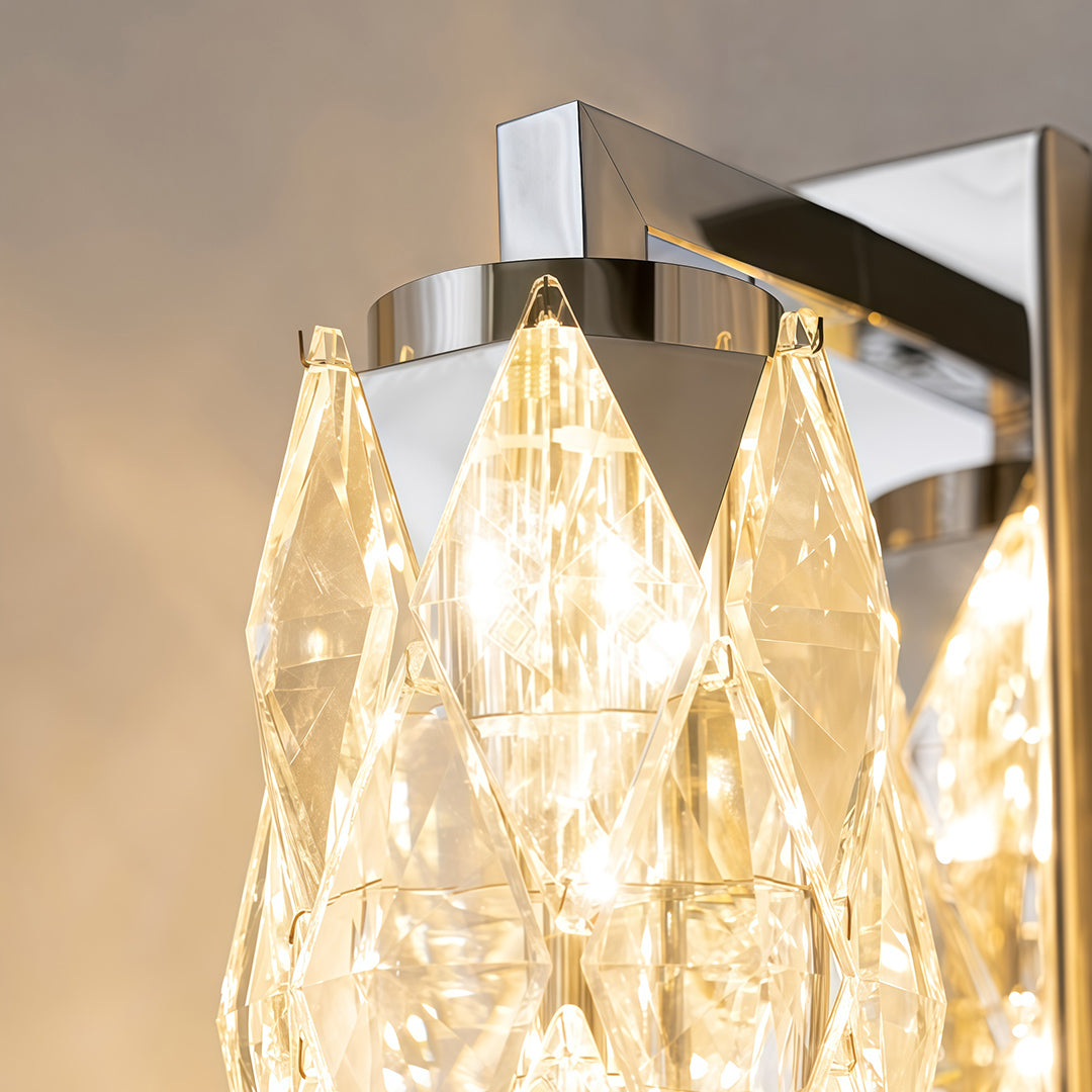 Modern wall light illuminating minimalist hallway with soft ambient glow on grey wall.