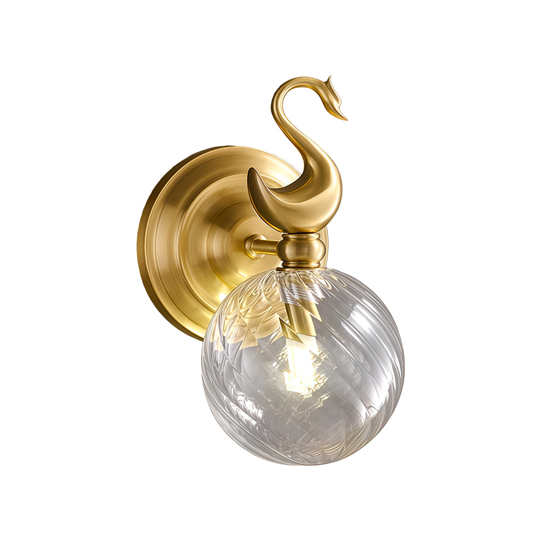 Modern wall mounted LED light featuring glass shade chandelier aesthetic with sculptural brass elephant and seeded glass sphere.