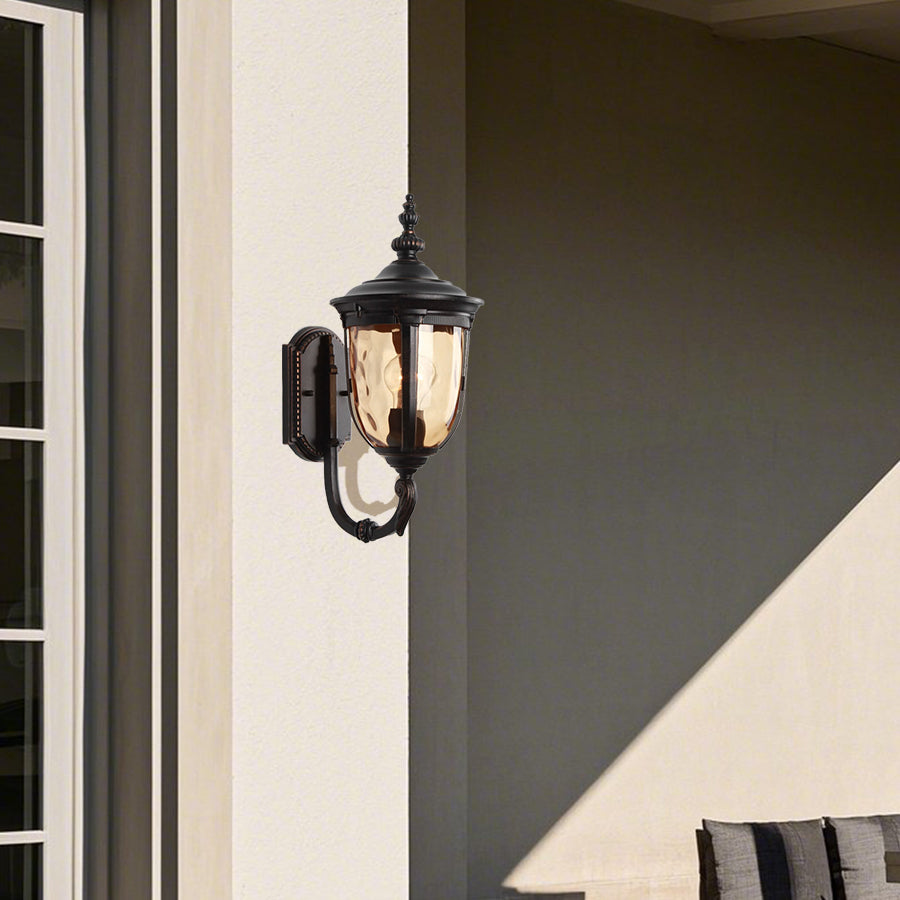 Modern outdoor wall sconce with clean lines mounted on contemporary building exterior