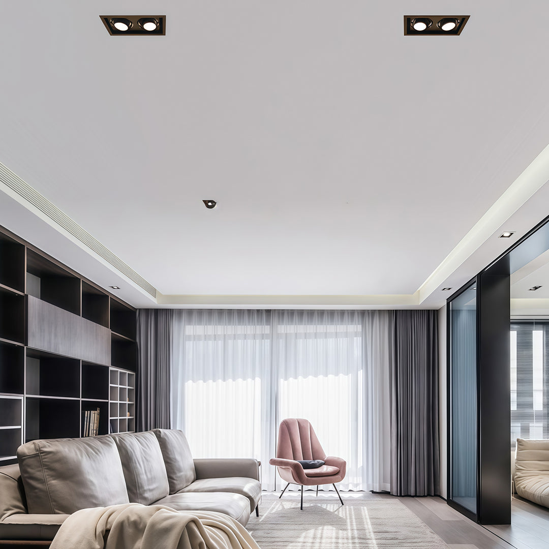 Modern white LED indoor spotlight featuring glass shade chandelier inspired design in contemporary residential interior.