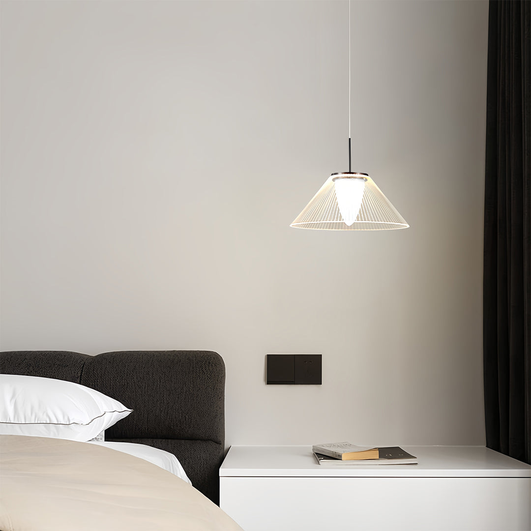 Modern white mesh pendant light with a black ceiling mount in a cozy interior