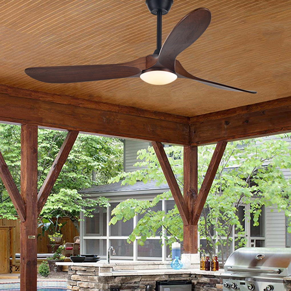 Modern wood ceiling fan with light with a close-up of its wooden blades and light.