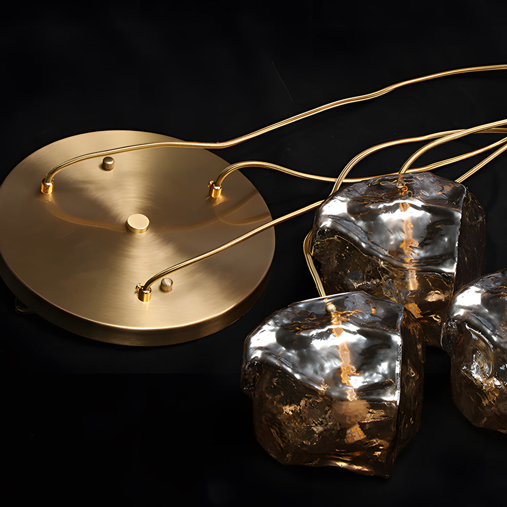 Molten rock pendant light with a close-up of the textured, molten rock details.