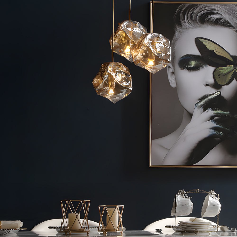 Molten rock pendant light casting a gentle glow in a chic dining room.