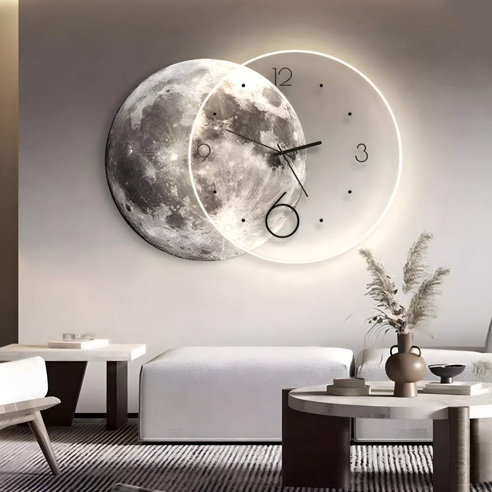 Moon wall clock light with a moon phase design, providing ambient lighting in a living room.