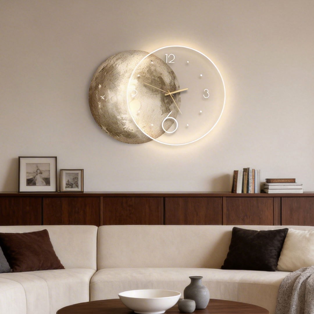 Moon wall clock light with a sleek design, illuminating a cozy corner with a sofa and decor.