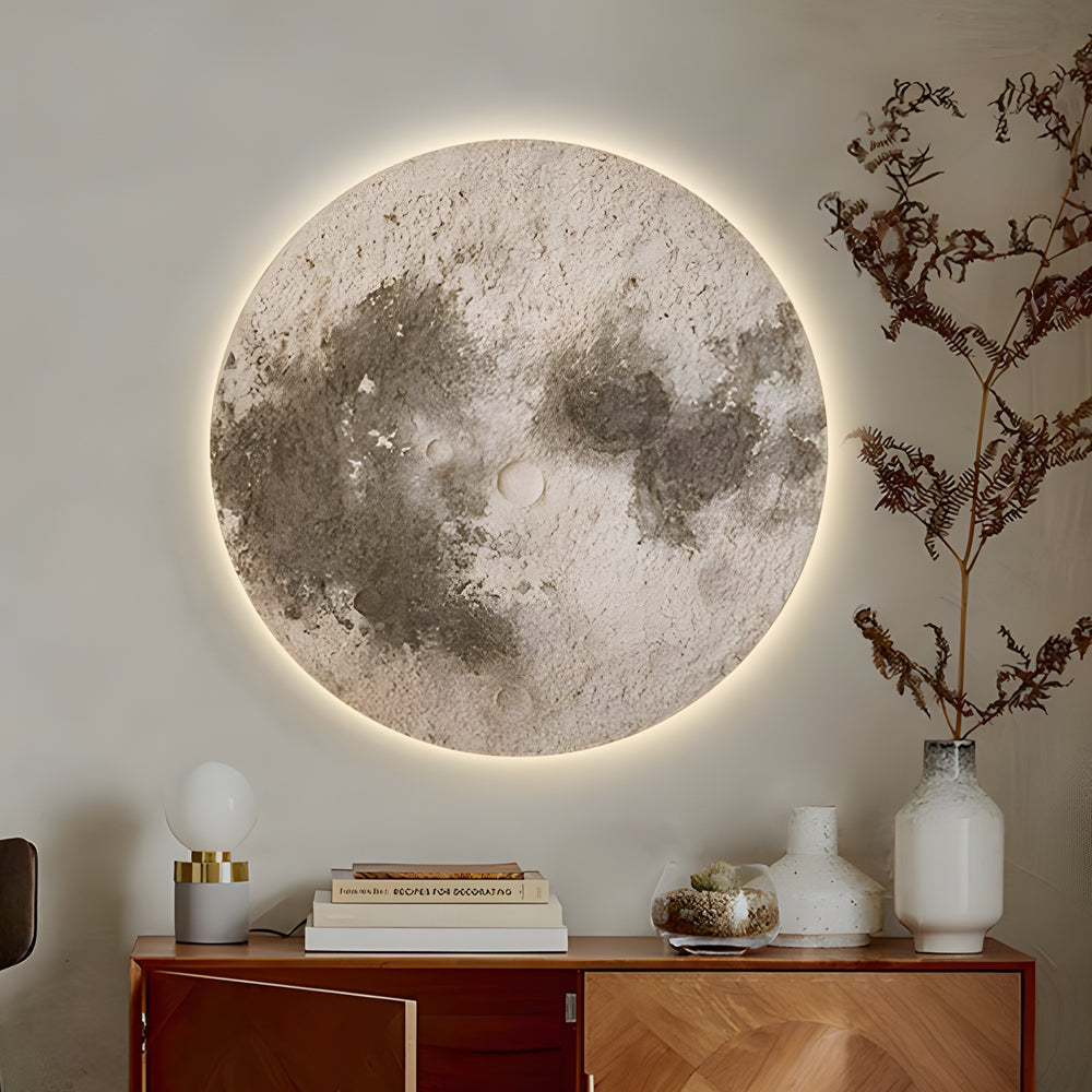 Moon wall lamp enhancing a contemporary living room with elegant, celestial design.
