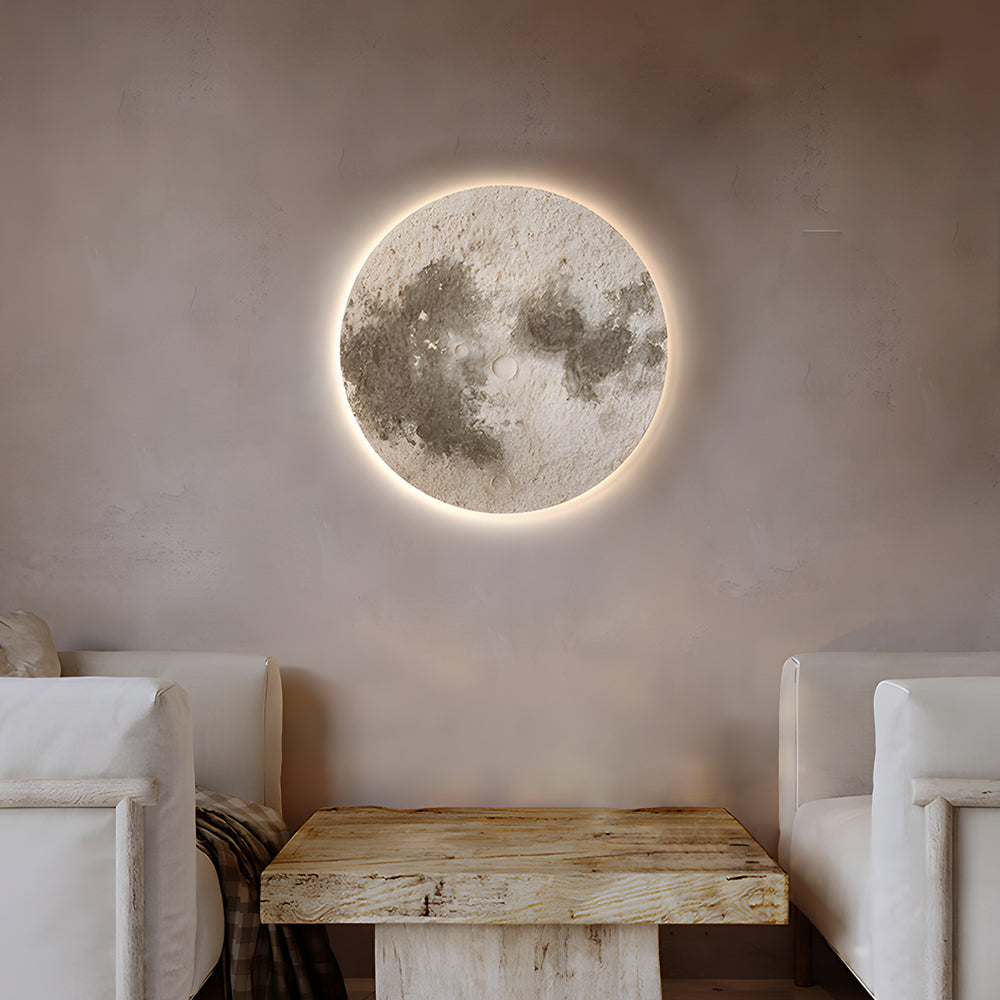 Moon wall lamp casting a gentle glow in a minimalist bedroom.