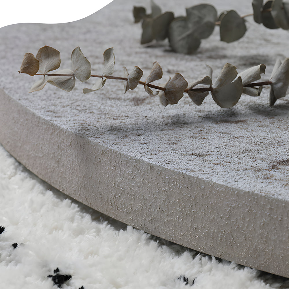 Moon wall lamp in natural finish, front view of the realistic design.