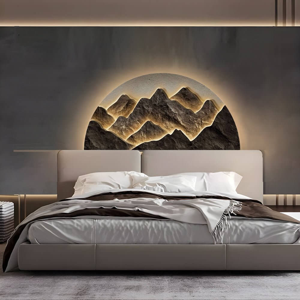 Mountain LED wall light with a close-up view of its detailed mountain design.