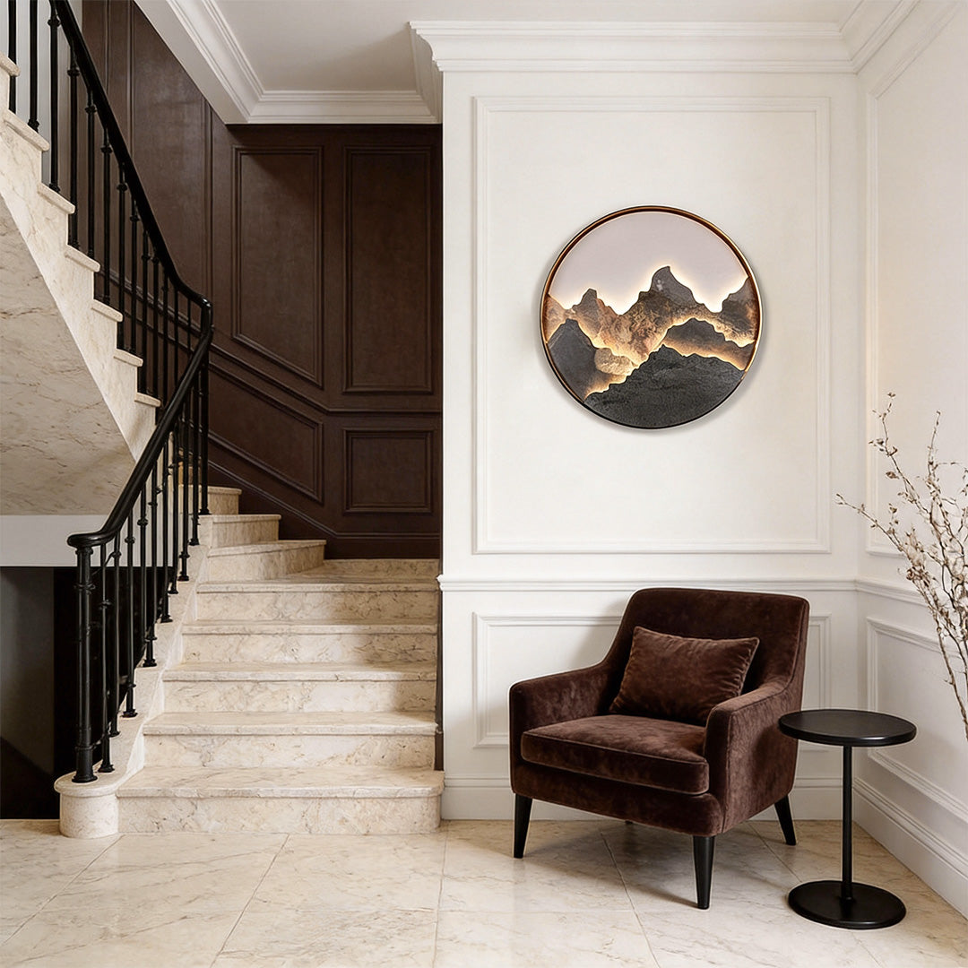 Mountain LED wall light installed in a modern entryway with staircase