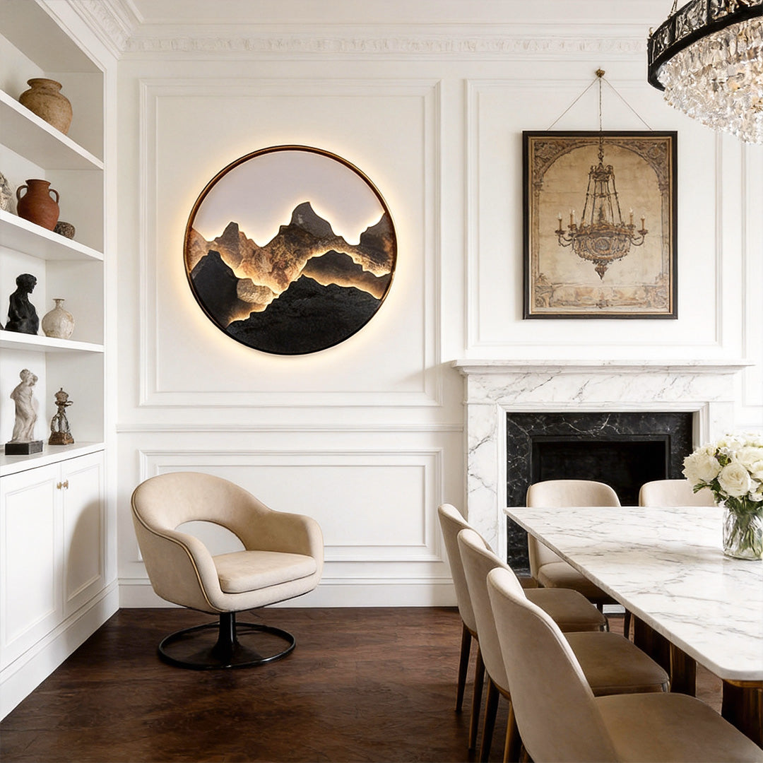 Mountain LED wall light mounted on a living room wall above seating area