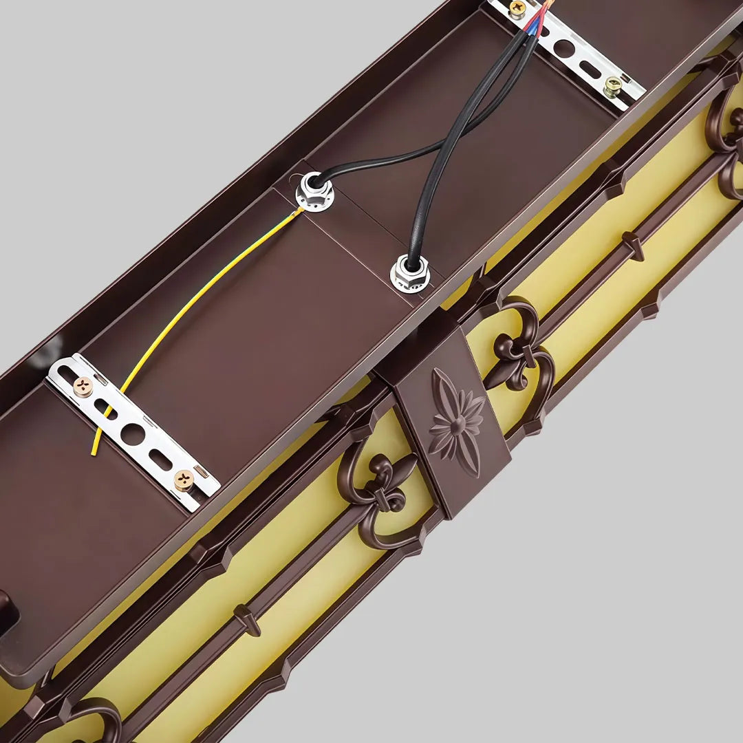 Close-up of vintage wall sconce lighting showing the rear mounting plate and internal fixture details.