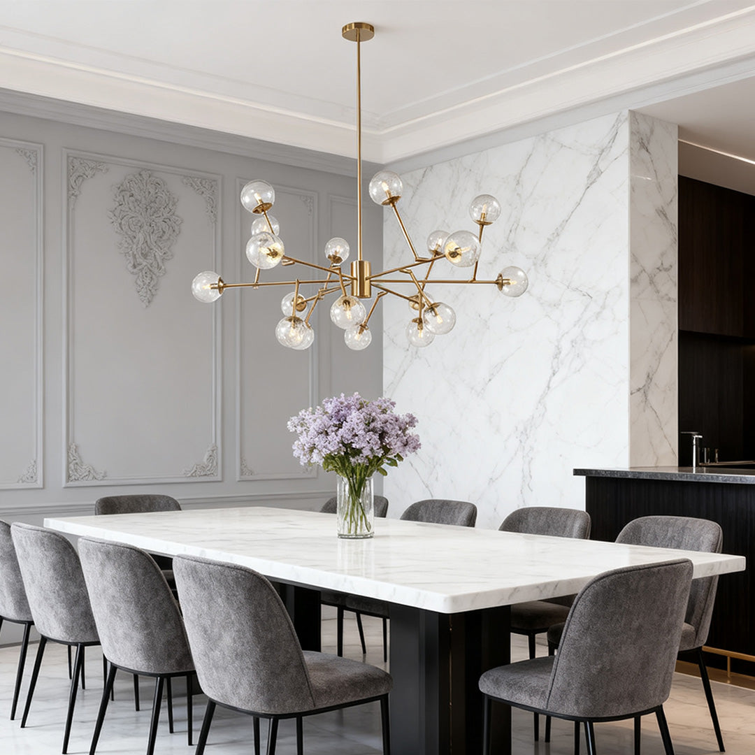 Multi-arm bubble sputnik chandelier highlighting the intricate brass framework and providing ample ambient lighting in a living space.