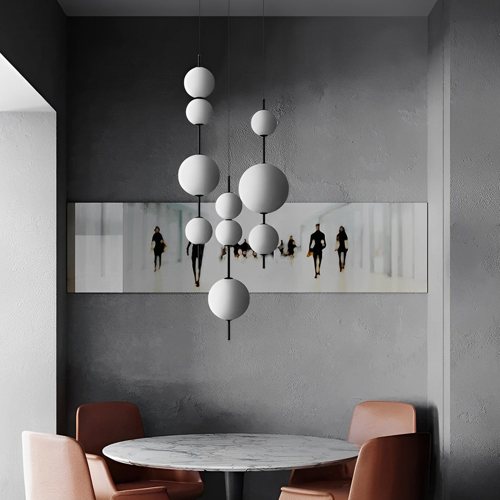 Multi ball pendant light with a close-up of its spherical design and modern finish.