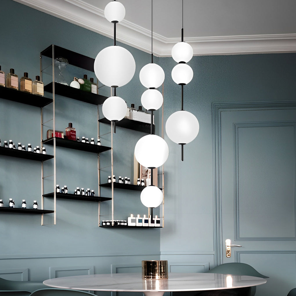 Multi ball pendant light providing soft lighting in a cozy dining room.