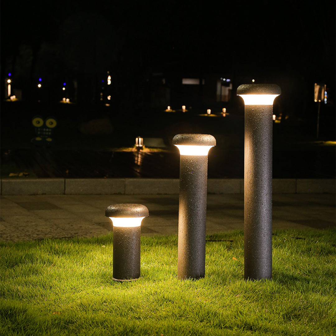 Various height bollard lights showcasing different lighting effects at night