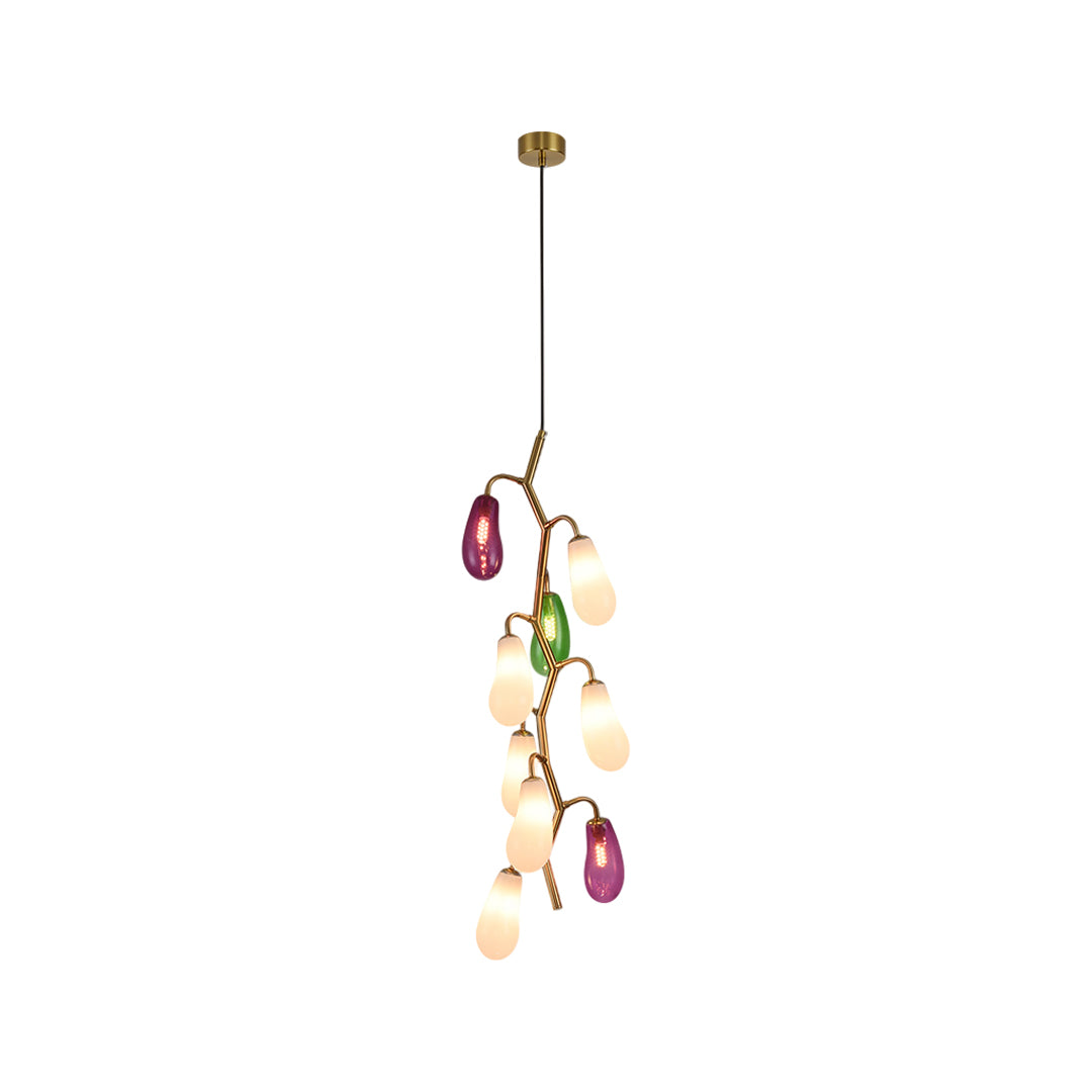 Clustered multi pendant light fixture with mixed color glass arrangement.