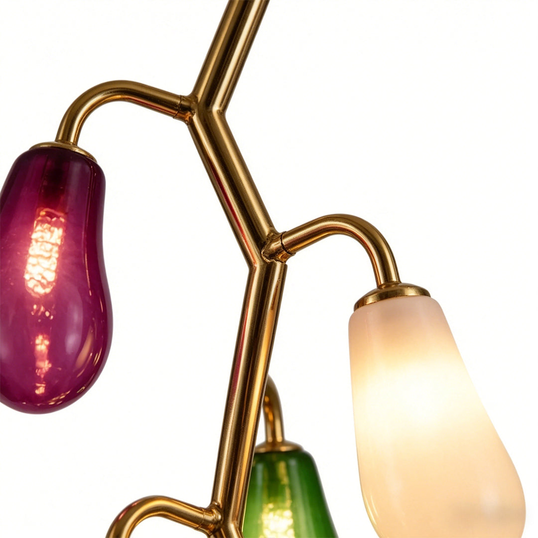 Close-up of colorful glass shades on a multi pendant light fixture.