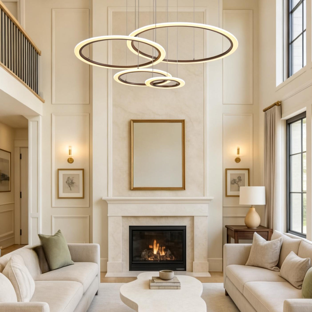A multi-ring chandelier uses vertical space in a double-height living room.