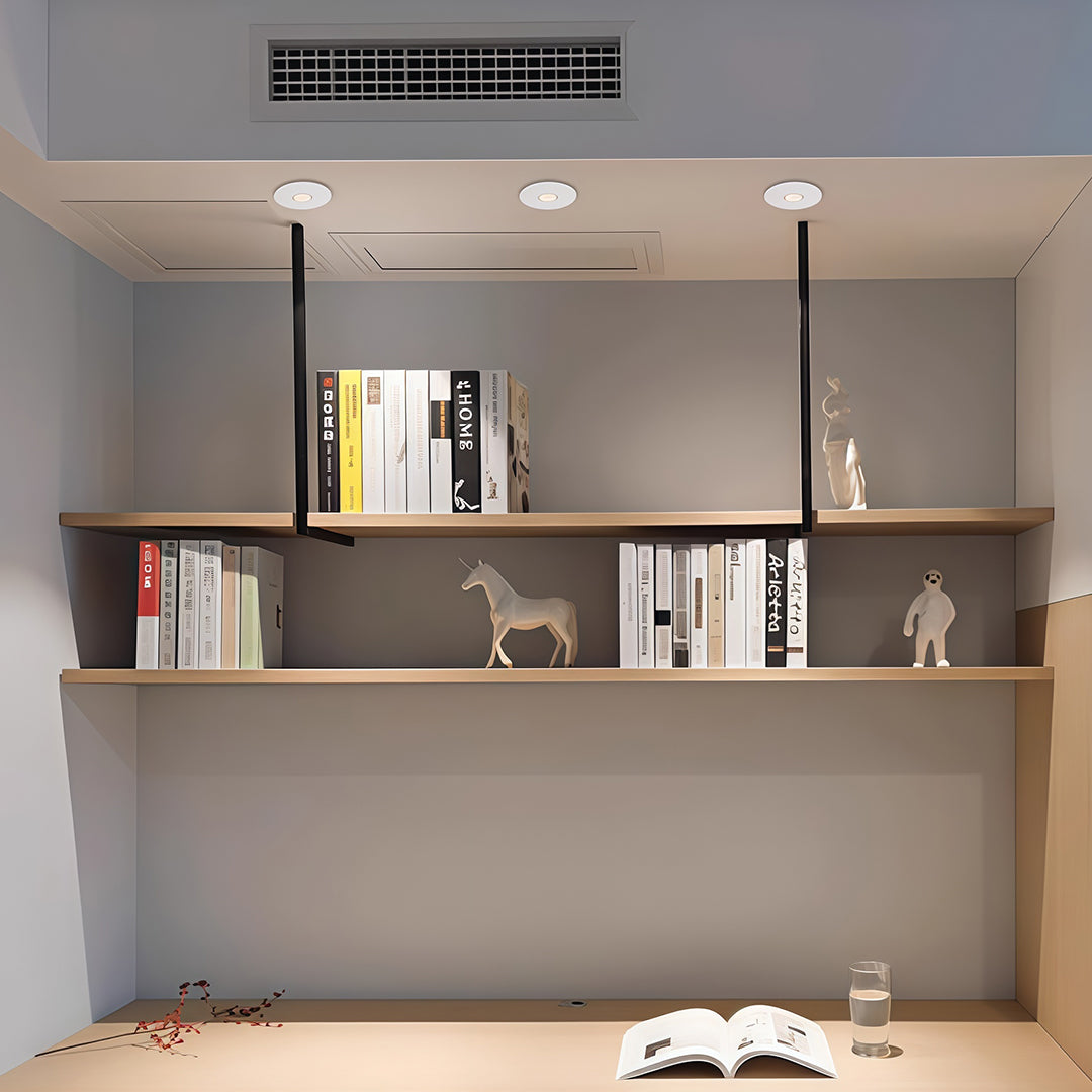 Multiple accent spotlights brightening modern hallway with wood shelving and warm neutral palette