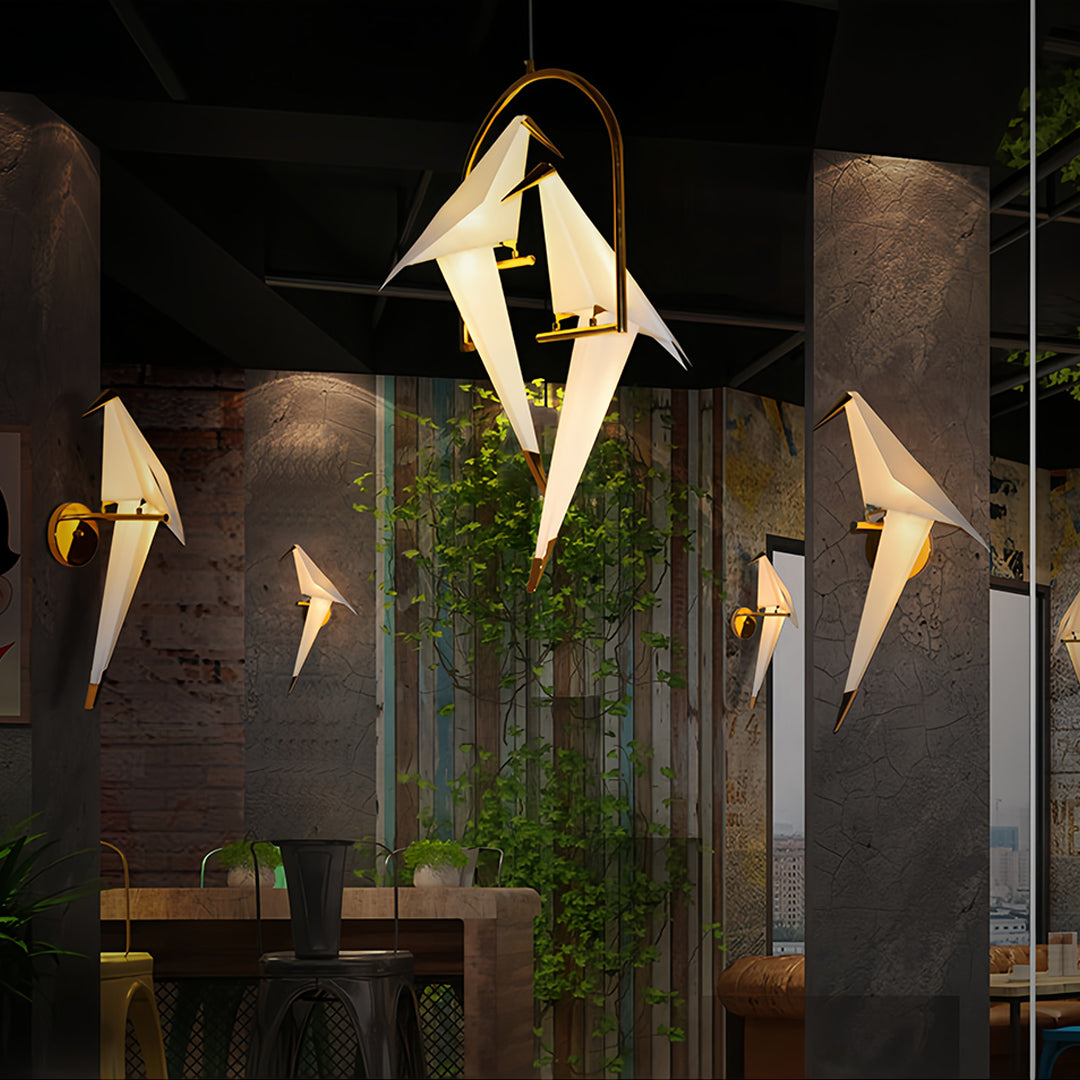 Premium bird wall light collection with multiple crane fixtures creating dramatic interior accent