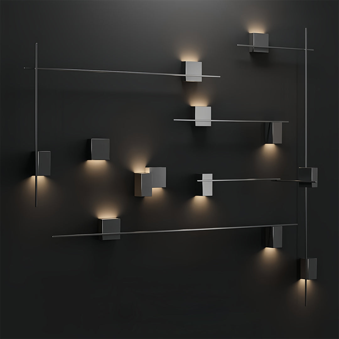 Multiple decor wall lights arranged in dark room creating ambient lighting display with geometric fixtures