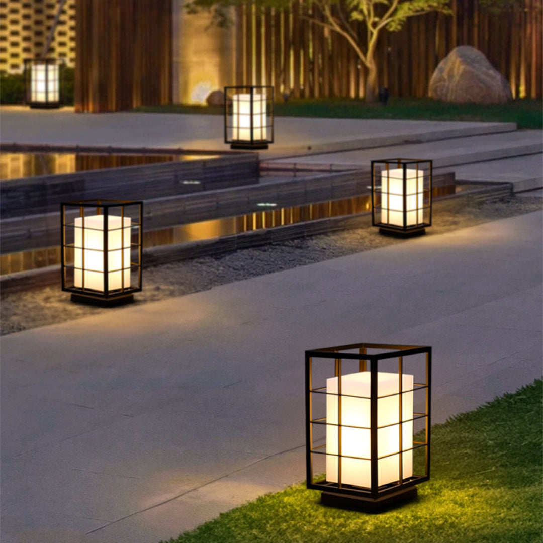 Multiple lantern lights arranged on modern outdoor terrace with contemporary architecture