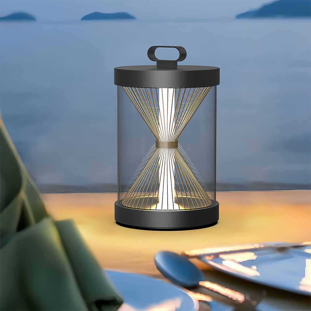 Multiple black outdoor lantern post cap lights illuminating the steps and perimeter of a modern home and swimming pool area.