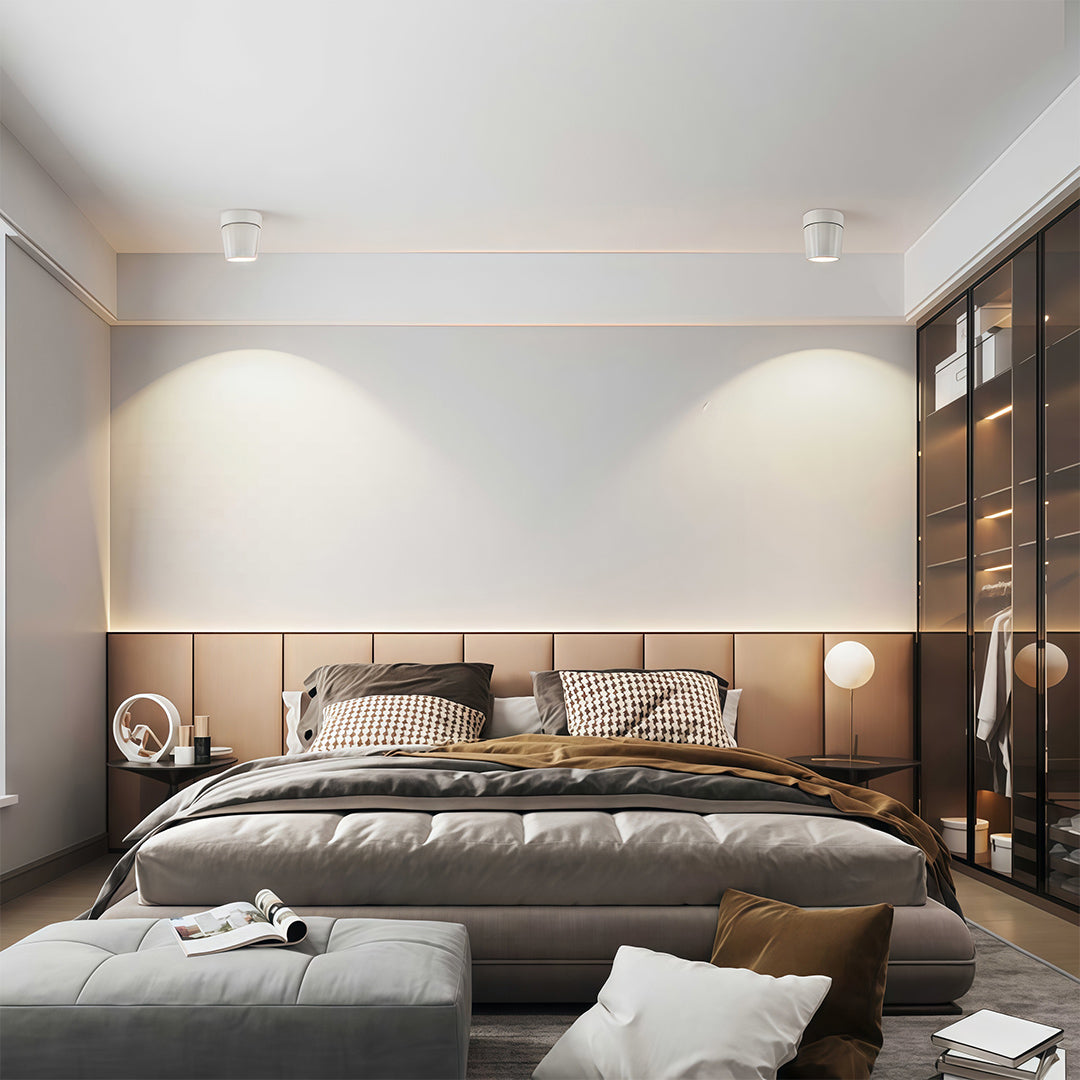 Multiple rotating spotlights creating layered illumination in luxurious bedroom with wood paneling and warm tones