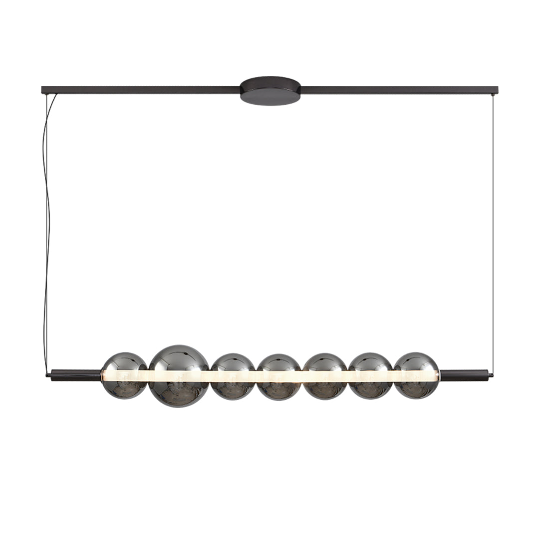 Contemporary silver pendant light for kitchen island design featuring multiple spherical fixtures in row configuration