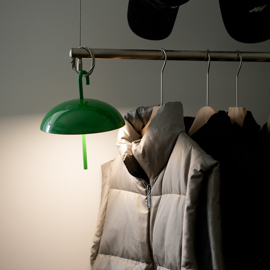 Multiple USB rechargeable table lamps creating layered lighting in modern closet space