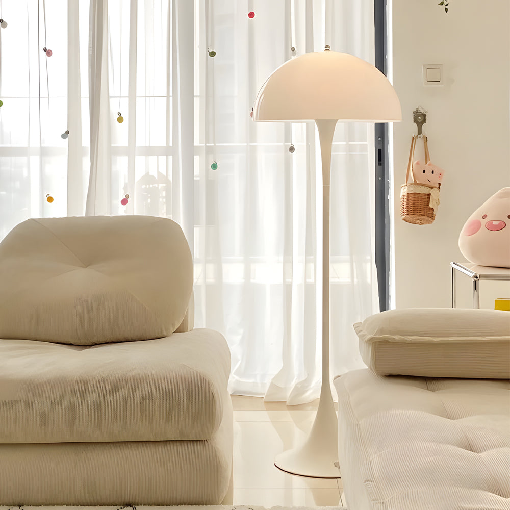 Mushroom floor lamp with a minimalist design, standing beside a beige sofa.