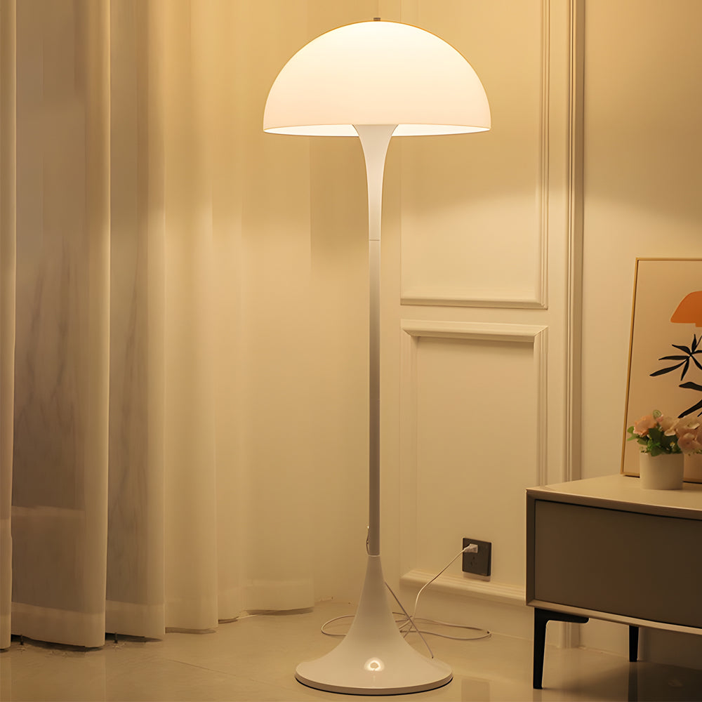 Mushroom floor lamp with a white dome shade, providing soft light in a modern interior.