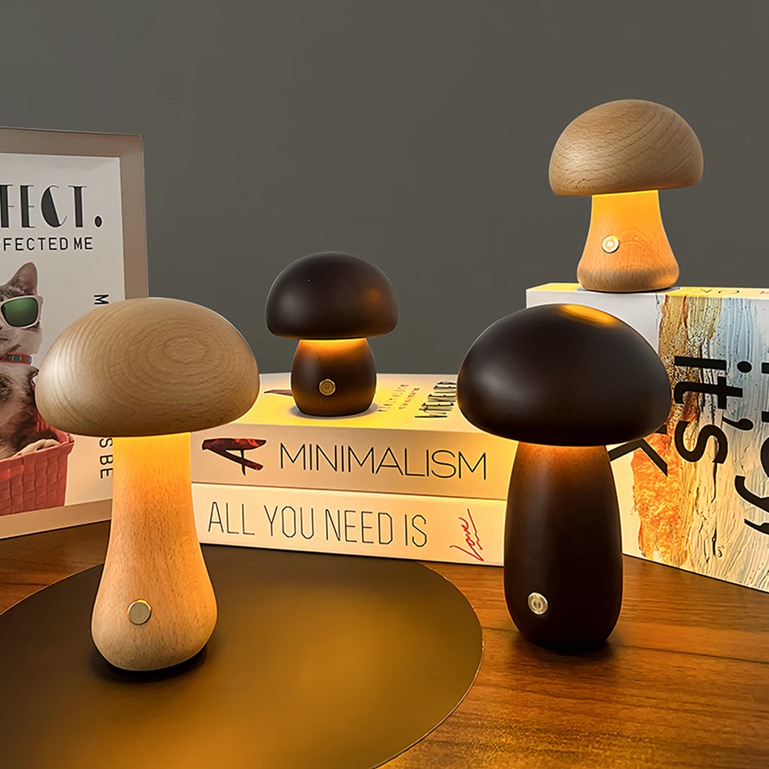Collection of mushroom table lamps displayed on wooden surface with warm ambient lighting