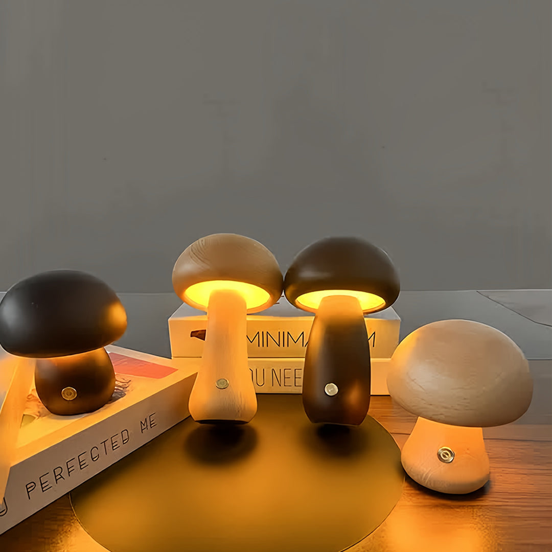 Multiple mushroom table lamps arranged on desk with books creating cozy reading atmosphere