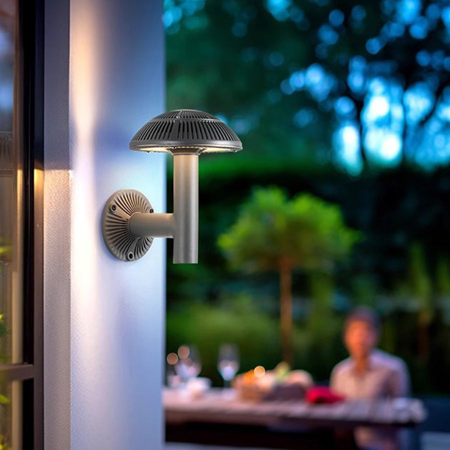 Modern mushroom-style patio heater creating warm ambiance for outdoor dining and entertainment