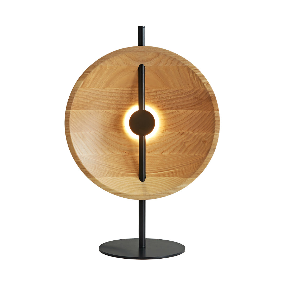 Natural wood table lamp with circular wood shade and sleek black base.