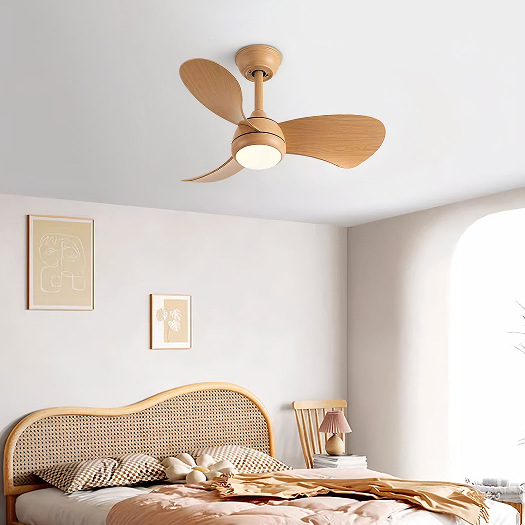 Natural wood retro ceiling fan with light complementing boho bedroom with rattan and organic materials